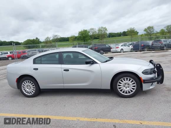 2020 Dodge Charger Police z VIN 2C3CDXKT7LH130458, wystawiony jako IAAI lot #42824039 z przebiegiem 123 319 mil mil oraz . Historia ofert i sprzedaży dostępna na DreamBid. Obrazek 13.