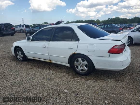 1999 Honda Accord EX with VIN 1HGCG1653XA013722, listed as a Copart auction lot 71023805 with 217,852 mi miles and Salvage title. Bid and sale history available at DreamBid. Image 2.