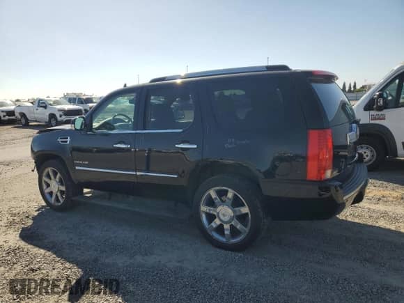 2011 Cadillac Escalade Premium with VIN 1GYS4CEFXBR381814, listed as a Copart auction lot 85574955 with 153,538 mi miles and Salvage title. Bid and sale history available at DreamBid. Image 2.