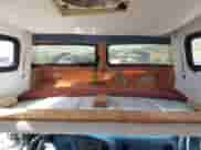 1996 Ford Econoline Cargo with VIN 1FDHS24H9THA55752, listed as a IAAI auction lot 42052800 with 117,680 mi miles and . Bid and sale history available at DreamBid. Image 20.