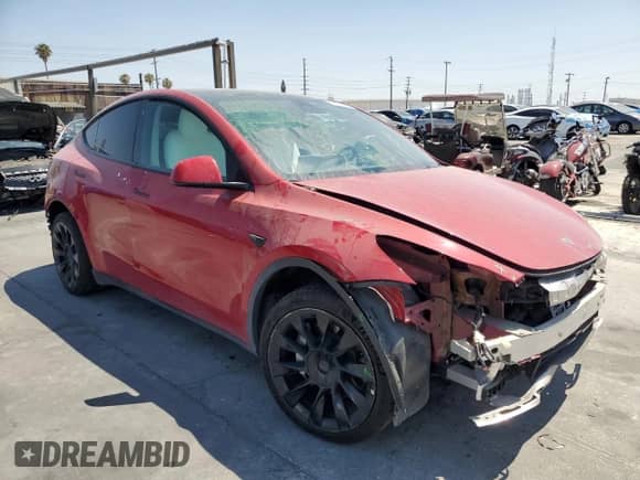 2023 Tesla Model Y Long Range with VIN 7SAYGDEE3PF629096, listed as a Copart auction lot 62891715 with 72,872 mi miles and Salvage title. Bid and sale history available at DreamBid. Image 4.