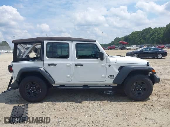 2021 Jeep Wrangler Unlimited Sport Altitude with VIN 1C4HJXDN3MW759324, listed as a IAAI auction lot 43048122 with 65,984 mi miles and . Bid and sale history available at DreamBid. Image 14.