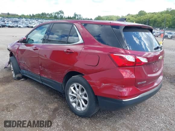 2020 Chevrolet Equinox LT with VIN 3GNAXKEV0LS573663, listed as a IAAI auction lot 43031569 with 63,690 mi miles and . Bid and sale history available at DreamBid. Image 3.