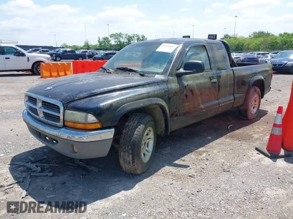 2004 Dodge Dakota SLT with VIN 1D7GL42K64S657235, listed as a IAAI auction lot 42121847 with 157,557 mi miles and . Bid and sale history available at DreamBid. Image 2.