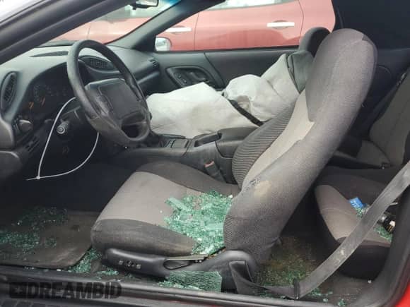 1995 Chevrolet Camaro с VIN 2G1FP32S7S2157444, выставлен на аукционе Copart как лот 76375664 с пробегом Не указан миль и Списание • Salvage title. История ставок и продаж доступна на DreamBid. Изображение 7.