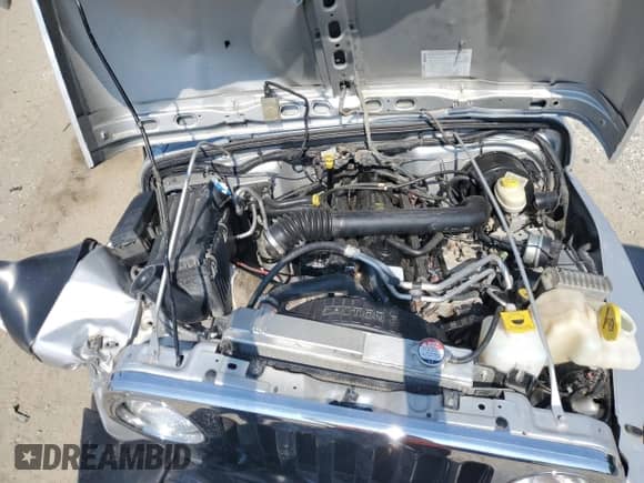 2004 Jeep Wrangler Rubicon with VIN 1J4FA69S34P788004, listed as a Copart auction lot 62361445 with Not provided miles and Salvage title. Bid and sale history available at DreamBid. Image 12.