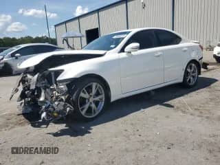 2009 Lexus IS 250 with VIN JTHBK262X95100709, listed as a Copart auction lot 70694915 with 128,828 mi miles and Salvage title. Bid and sale history available at DreamBid. Image 1.