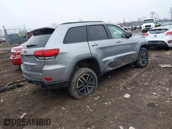 2021 Jeep Grand Cherokee Trailhawk z VIN 1C4RJFLG2MC579884, wystawiony jako IAAI lot #41526769 z przebiegiem 115 461 mil mil oraz . Historia ofert i sprzedaży dostępna na DreamBid. Obrazek 4.