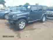 2007 Jeep Wrangler Unlimited Sahara z VIN 1J4GA591X7L117415, wystawiony jako IAAI lot #42509979 z przebiegiem 96 192 mil mil oraz . Historia ofert i sprzedaży dostępna na DreamBid. Obrazek 2.