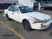 1996 Toyota Camry LE z VIN 4T1BF12K1TU871333, wystawiony jako IAAI lot #42295901 z przebiegiem 196 769 mil mil oraz . Historia ofert i sprzedaży dostępna na DreamBid. Obrazek 1.