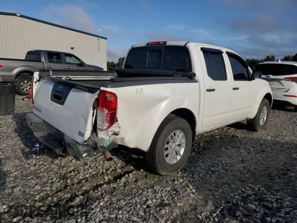 2016 Nissan Frontier S with VIN 1N6AD0ER9GN775021, listed as a Copart auction lot 85529945 with 137,858 mi miles and Salvage title. Bid and sale history available at DreamBid. Image 3.