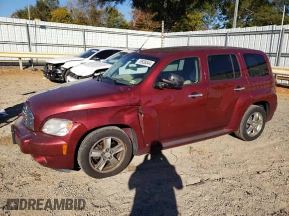 2009 Chevrolet HHR 1LT with VIN 3GNCA23B49S590428, listed as a Copart auction lot 76938344 with 142,357 mi miles and Salvage title. Bid and sale history available at DreamBid. Image 1.