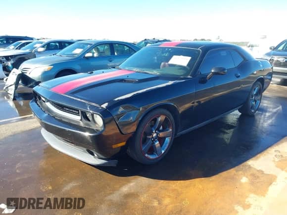 2012 Dodge Challenger SXT с VIN 2C3CDYAG1CH294802, выставлен на аукционе IAAI как лот 43475559 с пробегом 180 093 миль миль и . История ставок и продаж доступна на DreamBid. Изображение 19.