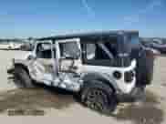 2024 Jeep Wrangler Sport S with VIN 1C4PJXDN7RW243762, listed as a Copart auction lot 77188874 with 18,935 mi miles and Salvage title. Bid and sale history available at DreamBid. Image 2.