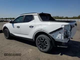 2022 Hyundai Santa Cruz SEL с VIN 5NTJCDAE9NH017954, выставлен на аукционе Copart как лот 70330024 с пробегом 61 631 миль миль и Списание • Salvage title. История ставок и продаж доступна на DreamBid. Изображение 2.