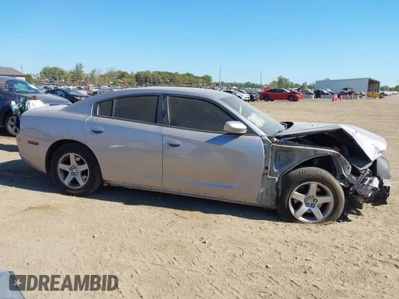 2013 Dodge Charger SE z VIN 2C3CDXBG5DH605898, wystawiony jako IAAI lot #43373283 z przebiegiem 159 075 mil mil oraz . Historia ofert i sprzedaży dostępna na DreamBid. Obrazek 13.