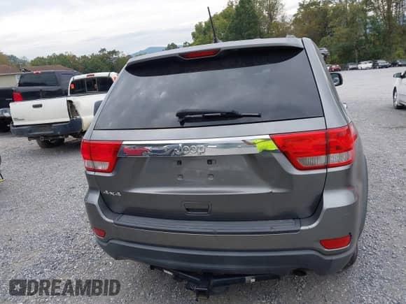 2012 Jeep Grand Cherokee Laredo with VIN 1C4RJFAG3CC272631, listed as a IAAI auction lot 43291923 with 168,220 mi miles and . Bid and sale history available at DreamBid. Image 17.