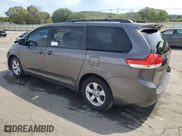 2014 Toyota Sienna LE AAS with VIN 5TDKK3DCXES437212, listed as a Copart auction lot 70334955 with 267,885 mi miles and Salvage title. Bid and sale history available at DreamBid. Image 2.