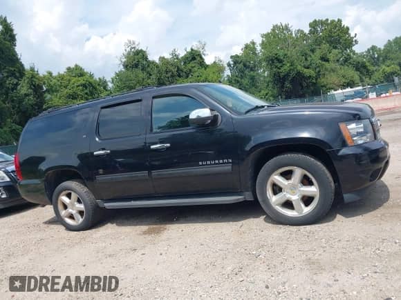 2012 Chevrolet Suburban LT z VIN 1GNSKJE7XCR117879, wystawiony jako IAAI lot #43005567 z przebiegiem 166 242 mil mil oraz . Historia ofert i sprzedaży dostępna na DreamBid. Obrazek 13.
