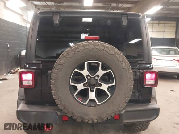 2021 Jeep Wrangler Unlimited Rubicon with VIN 1C4HJXFG9MW736127, listed as a IAAI auction lot 42213072 with 60,865 mi miles and . Bid and sale history available at DreamBid. Image 16.