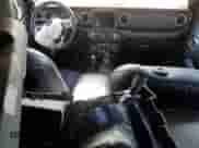 2022 Jeep Wrangler Unlimited Sahara Altitude with VIN 1C4HJXEG0NW255878, listed as a Copart auction lot 41437565 with 33,328 mi miles and Non repairable. Bid and sale history available at DreamBid. Image 8.