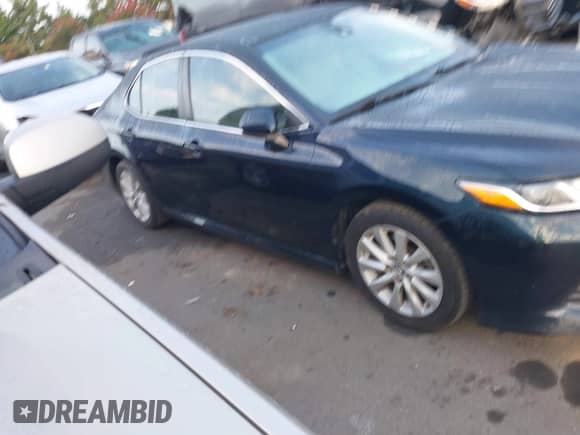 2018 Toyota Camry SE with VIN 4T1B11HK2JU647720, listed as a IAAI auction lot 42849487 with 159,188 mi miles and . Bid and sale history available at DreamBid. Image 13.