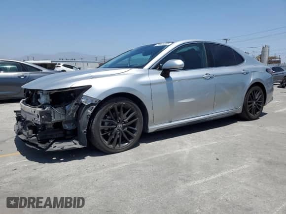 2022 Toyota Camry Hybrid XSE с VIN 4T1K31AK1NU036801, выставлен на аукционе Copart как лот 61826905 с пробегом 113 437 миль миль и Списание • Salvage title. История ставок и продаж доступна на DreamBid. Изображение 1.