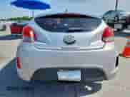 2012 Hyundai Veloster w/Red Int z VIN KMHTC6ADXCU036716, wystawiony jako Copart lot #63408115 z przebiegiem 144 117 mil mil oraz Szkoda całkowita • Salvage title. Historia ofert i sprzedaży dostępna na DreamBid. Obrazek 6.