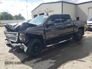 2015 Chevrolet Silverado 1500 LT with VIN 3GCUKREC9FG131855, listed as a Copart auction lot 83823645 with 145,325 mi miles and Salvage title. Bid and sale history available at DreamBid. Image 1.