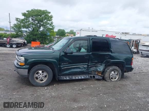 2002 Chevrolet Tahoe LT with VIN 1GNEK13Z82J242927, listed as a IAAI auction lot 42451647 with 221,646 mi miles and . Bid and sale history available at DreamBid. Image 14.