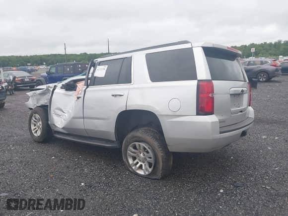 2019 Chevrolet Tahoe LS with VIN 1GNSKAKC2KR185738, listed as a IAAI auction lot 42325196 with Not provided miles and . Bid and sale history available at DreamBid. Image 14.