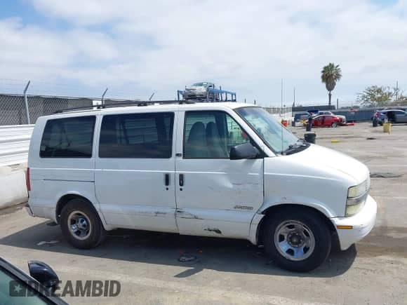 2002 Chevrolet Astro z VIN 1GNDM19X92B129672, wystawiony jako IAAI lot #42455077 z przebiegiem 132 368 mil mil oraz . Historia ofert i sprzedaży dostępna na DreamBid. Obrazek 13.