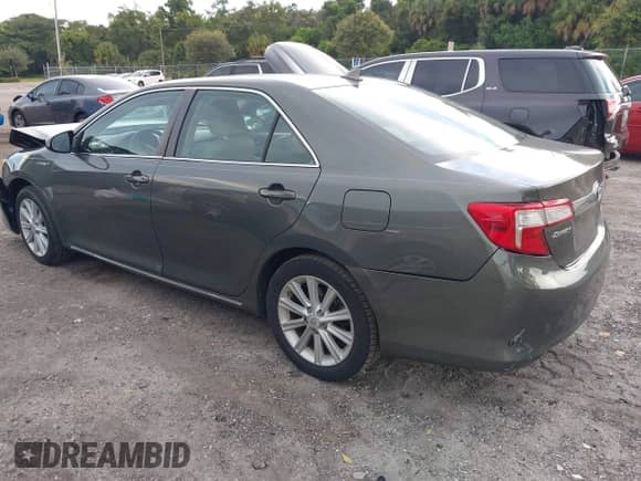 2013 Toyota Camry LE z VIN 4T1BD1FKXDU066965, wystawiony jako IAAI lot #43027264 z przebiegiem 98 455 mil mil oraz . Historia ofert i sprzedaży dostępna na DreamBid. Obrazek 3.