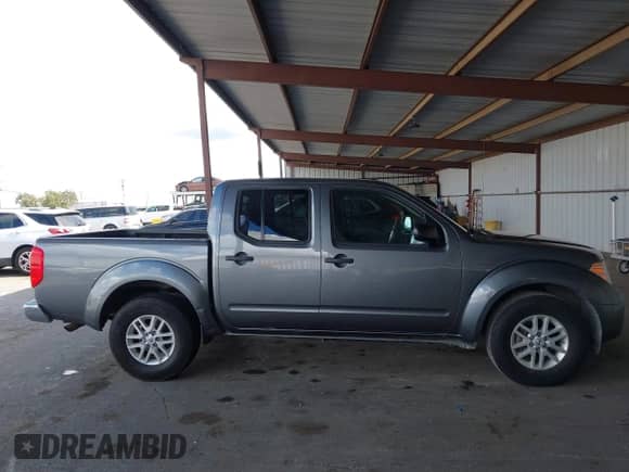 2018 Nissan Frontier SV with VIN 1N6AD0ER6JN735048, listed as a IAAI auction lot 43326700 with 124,053 mi miles and . Bid and sale history available at DreamBid. Image 13.