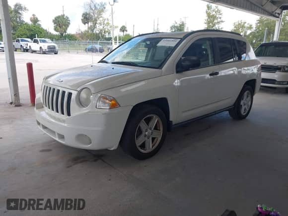 2008 Jeep Compass Sport with VIN 1J8FT47W78D661170, listed as a IAAI auction lot 43481804 with 179,362 mi miles and . Bid and sale history available at DreamBid. Image 2.