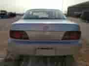 1995 Toyota Camry LE z VIN 4T1SK12C7SU548827, wystawiony jako Copart lot #64502944 z przebiegiem 215 266 mil mil oraz Szkoda całkowita • Salvage title. Historia ofert i sprzedaży dostępna na DreamBid. Obrazek 6.