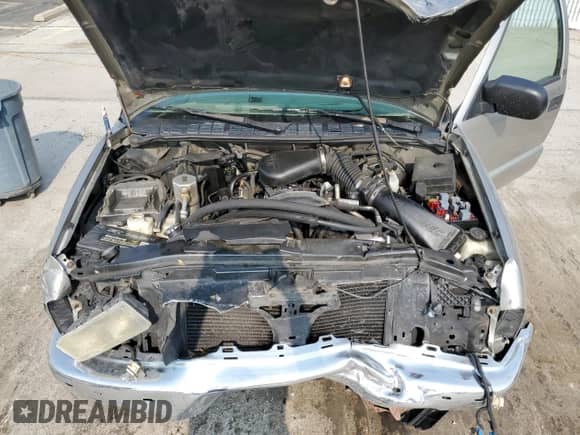 2001 Chevrolet Blazer LS with VIN 1GNCS18W71K262746, listed as a Copart auction lot 59582765 with 155,177 mi miles and Salvage title. Bid and sale history available at DreamBid. Image 12.