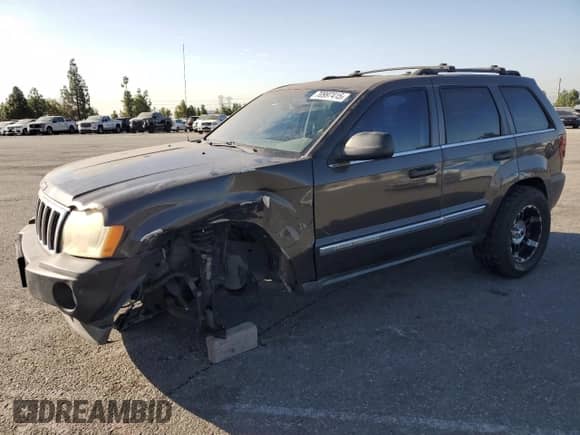 2006 Jeep Grand Cherokee Limited with VIN 1J4HS58N56C342300, listed as a Copart auction lot 70997415 with 167,201 mi miles and Salvage title. Bid and sale history available at DreamBid. Image 1.