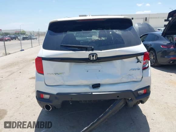 2025 Honda Passport EX-L with VIN 5FNYF8H55SB011791, listed as a IAAI auction lot 42749643 with 12,183 mi miles and . Bid and sale history available at DreamBid. Image 16.