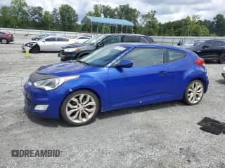 2012 Hyundai Veloster w/Black Int z VIN KMHTC6AD8CU027271, wystawiony jako Copart lot #63057155 z przebiegiem 153 048 mil mil oraz Czysty tytuł • Clean title. Historia ofert i sprzedaży dostępna na DreamBid. Obrazek 1.