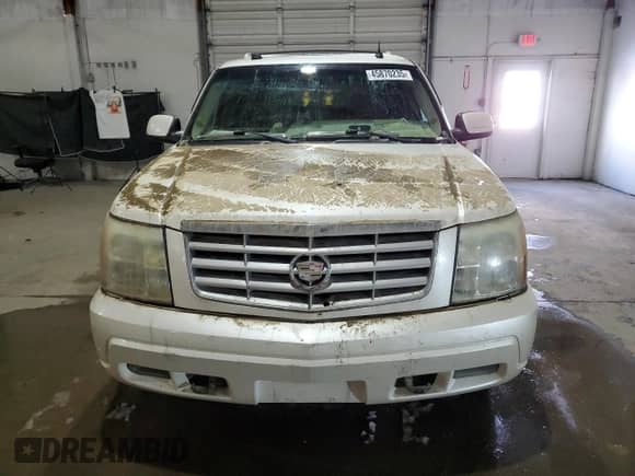 2004 Cadillac Escalade z VIN 1GYEK63N14R163813, wystawiony jako Copart lot #45870235 z przebiegiem Nie podano mil oraz Szkoda całkowita • Salvage title. Historia ofert i sprzedaży dostępna na DreamBid. Obrazek 5.