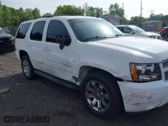2011 Chevrolet Tahoe LT with VIN 1GNSKBE05BR135228, listed as a IAAI auction lot 42695981 with 106,281 mi miles and . Bid and sale history available at DreamBid. Image 6.