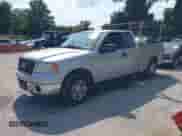 2007 Ford F-150 STX with VIN 1FTRX12WX7FA06762, listed as a IAAI auction lot 43010327 with 156,760 mi miles and . Bid and sale history available at DreamBid. Image 2.