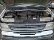 2000 Ford Econoline Cargo Recreational with VIN 1FDRE14L3YHA17676, listed as a Copart auction lot 58571465 with 174,129 mi miles and Salvage title. Bid and sale history available at DreamBid. Image 12.