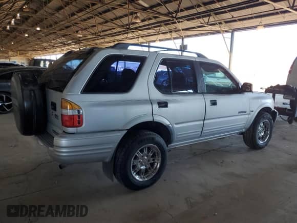 2000 Honda Passport LX with VIN 4S6CK58W6Y4409186, listed as a Copart auction lot 82193655 with 151,884 mi miles and Salvage title. Bid and sale history available at DreamBid. Image 3.