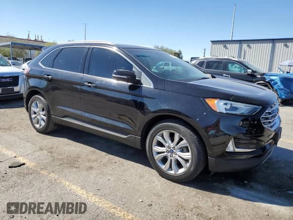 2019 Ford Edge Titanium with VIN 2FMPK3K90KBB89316, listed as a Copart auction lot 84446475 with 77,574 mi miles and Salvage title. Bid and sale history available at DreamBid. Image 4.
