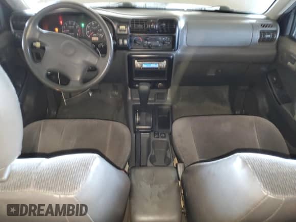 2000 Honda Passport LX with VIN 4S6CK58W6Y4409186, listed as a Copart auction lot 82193655 with 151,884 mi miles and Salvage title. Bid and sale history available at DreamBid. Image 8.