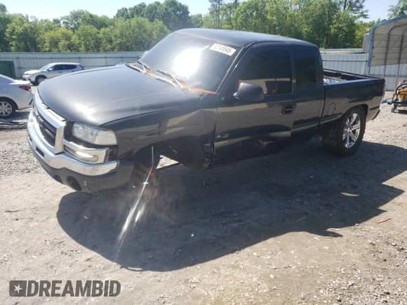 2003 GMC Sierra 1500 SLE with VIN 2GTEK19T331259948, listed as a Copart auction lot 52145845 with 214,374 mi miles and Salvage title. Bid and sale history available at DreamBid. Image 1.