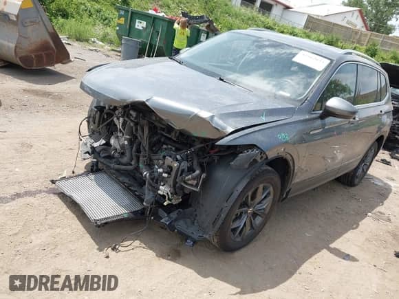 2023 Volkswagen Tiguan SE with VIN 3VV2B7AX1PM033069, listed as a IAAI auction lot 42562623 with 63,872 mi miles and . Bid and sale history available at DreamBid. Image 17.