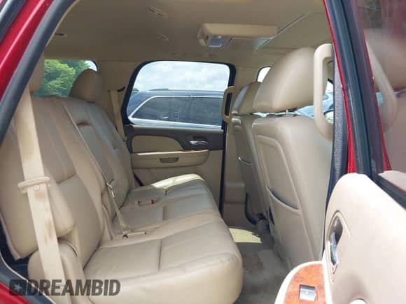 2013 Chevrolet Tahoe LT z VIN 1GNSKBE07DR140787, wystawiony jako IAAI lot #42792275 z przebiegiem 128 778 mil mil oraz . Historia ofert i sprzedaży dostępna na DreamBid. Obrazek 8.